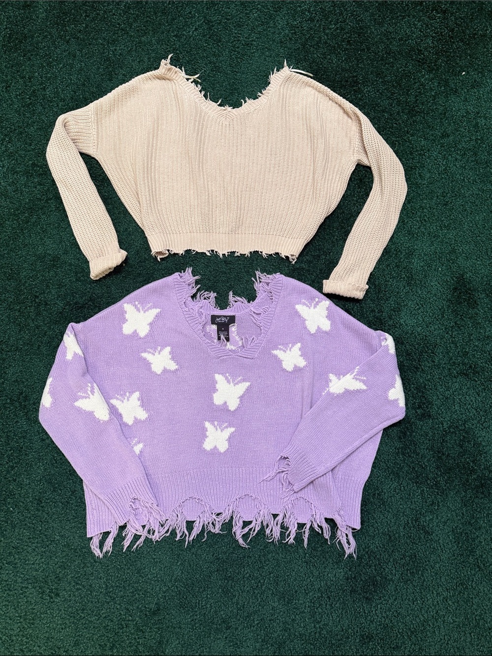 Just Polly distressed purple sweater,distressed Jessica Simpson beige sweater.